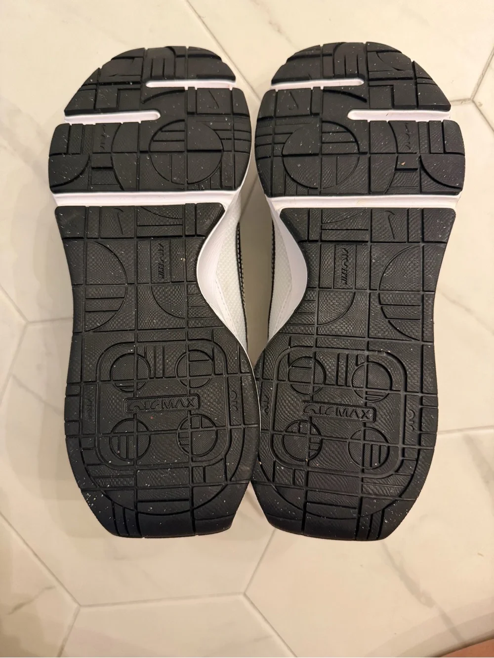 Nike White Sneakers with Black Swoosh and Gray Pull Tabs